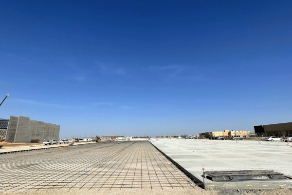 18,630 CY poured in 4 weeks; 250 tons of rebar