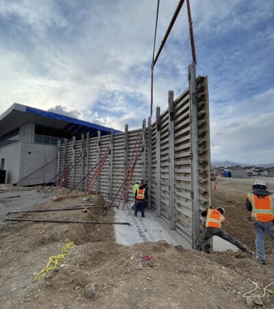 20' CIP concrete walls; 1,250 LF architectural walls