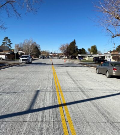 79,940 SF concrete roadway paving; 3,867 LF of curb